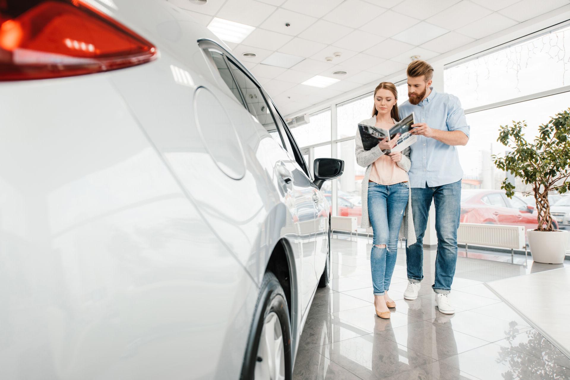 A couple goes car shopping after obtaining a credit union vehicle loan.